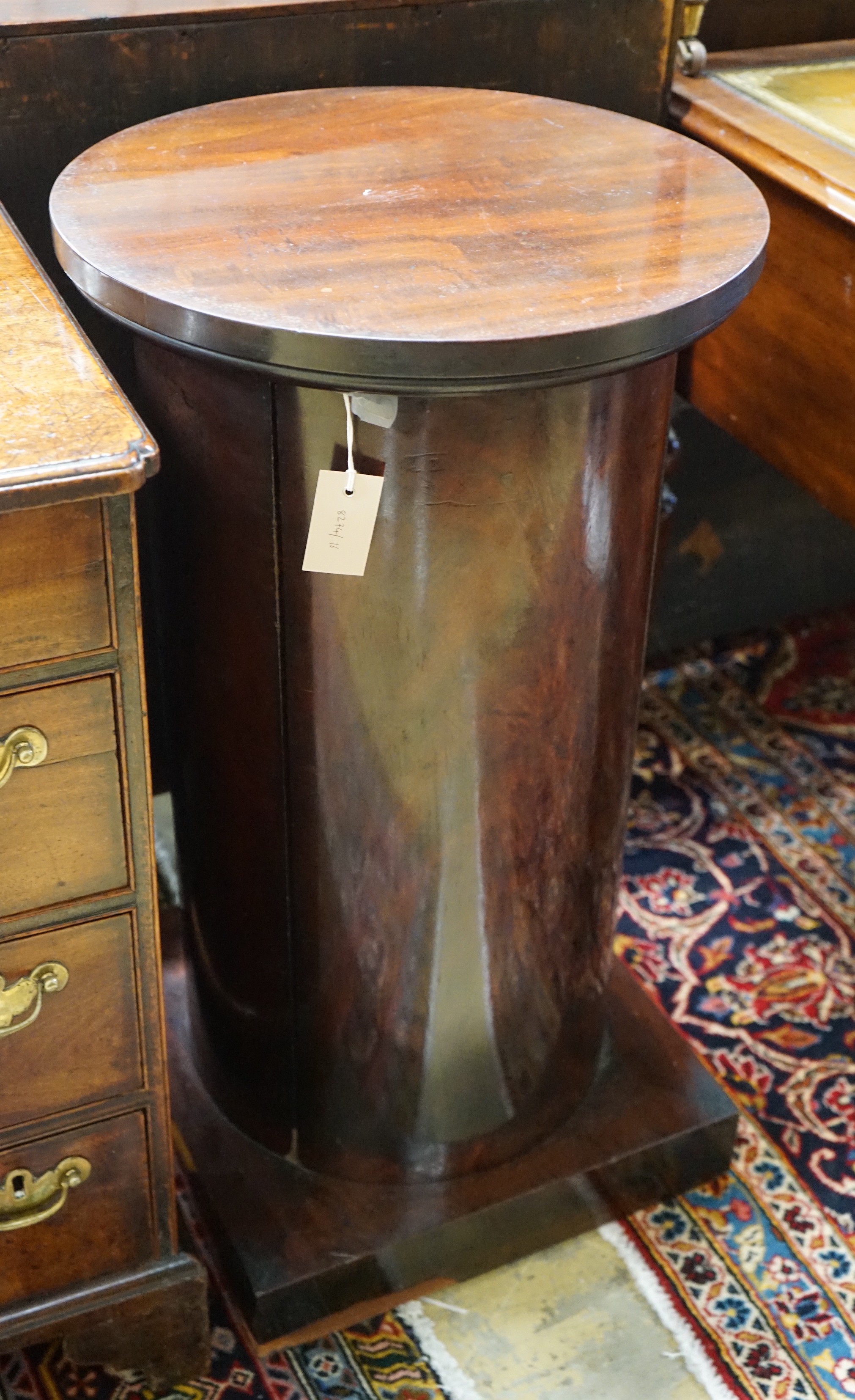 A Victorian circular mahogany pedestal cupboard, diameter 43cm, height 78cm